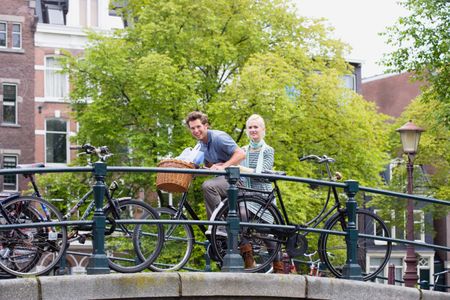 Cycling Through Amsterdam — 64-piece jigsaw puzzle