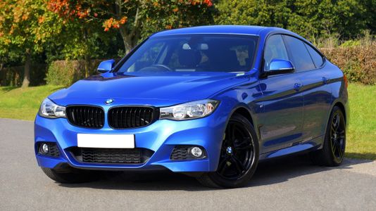Sleek Blue Sedan — 100-piece jigsaw puzzle