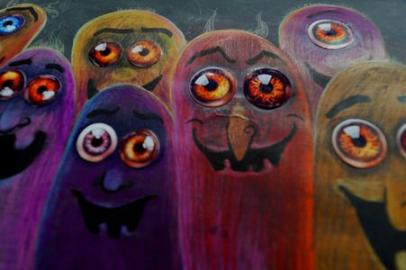 Vibrant Monster Faces — 64-piece jigsaw puzzle