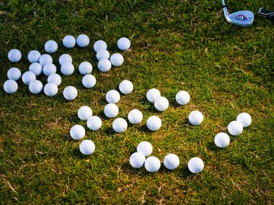 Scattered Golf Balls — 100-piece jigsaw puzzle