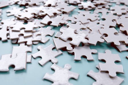 Scattered Puzzle Pieces — 100-piece jigsaw puzzle