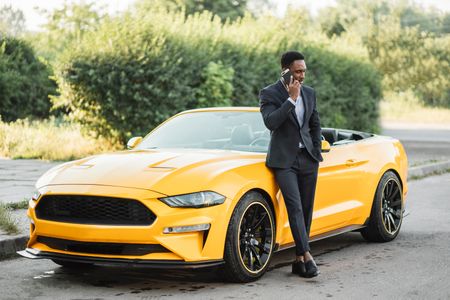 Businessman with Yellow Convertible — 150-piece jigsaw puzzle