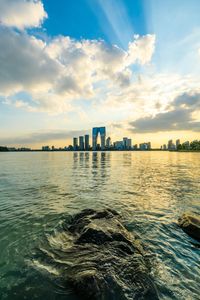 Sunlit Cityscape Reflections — 100-piece jigsaw puzzle