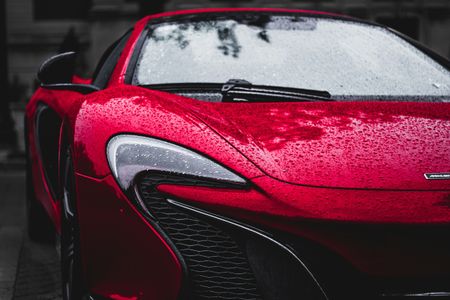 Rain-Kissed Red Supercar — 100-piece jigsaw puzzle