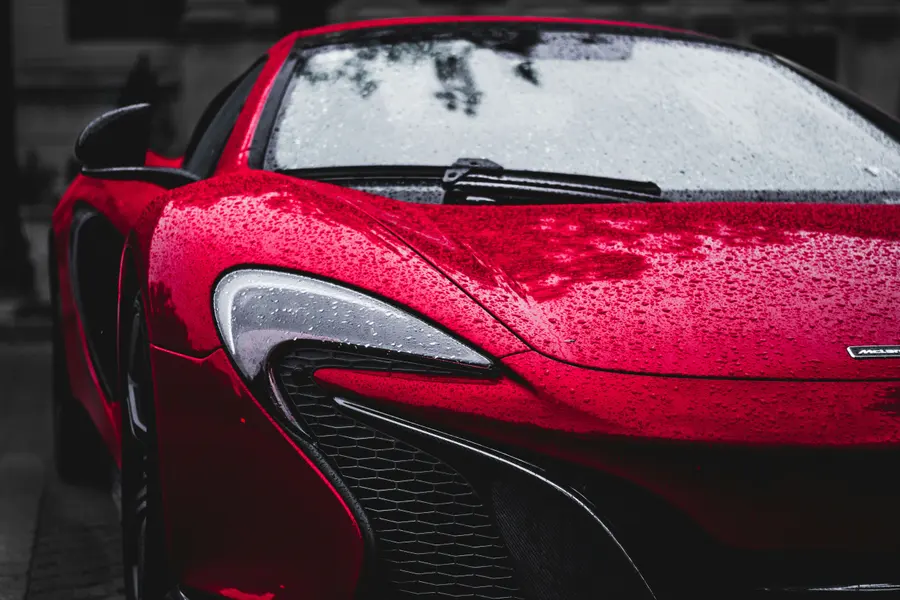 Rain-Kissed Red Supercar — 100-piece jigsaw puzzle