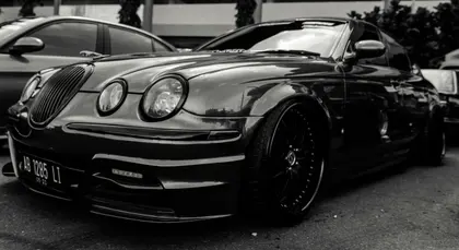 Sleek Black Sedan — 300-piece jigsaw puzzle