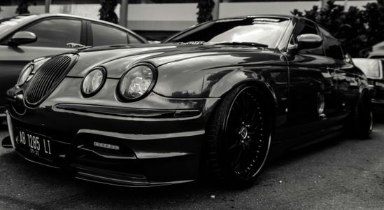Sleek Black Sedan — 300-piece jigsaw puzzle