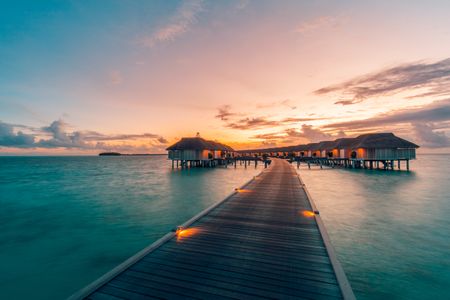 Sunset Over Water Bungalows — 150-piece jigsaw puzzle